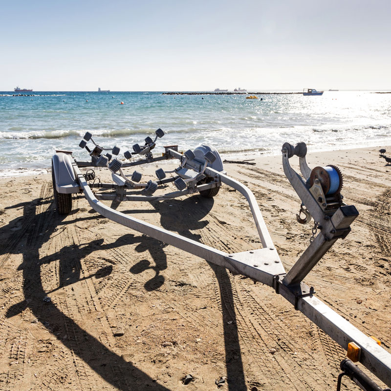 boat trailer backing into water